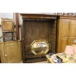 An Anglo Indian teak double wardrobe