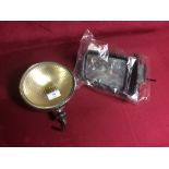 A Lucas fog lamp S/N fst7005 and a wing mirror for
