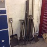 A quantity of various vintage garden tools