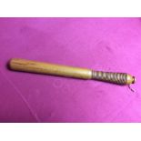 A Victorian boxwood truncheon with turned wooden h