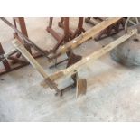 A wooden beam single furrow plough with wooden handle