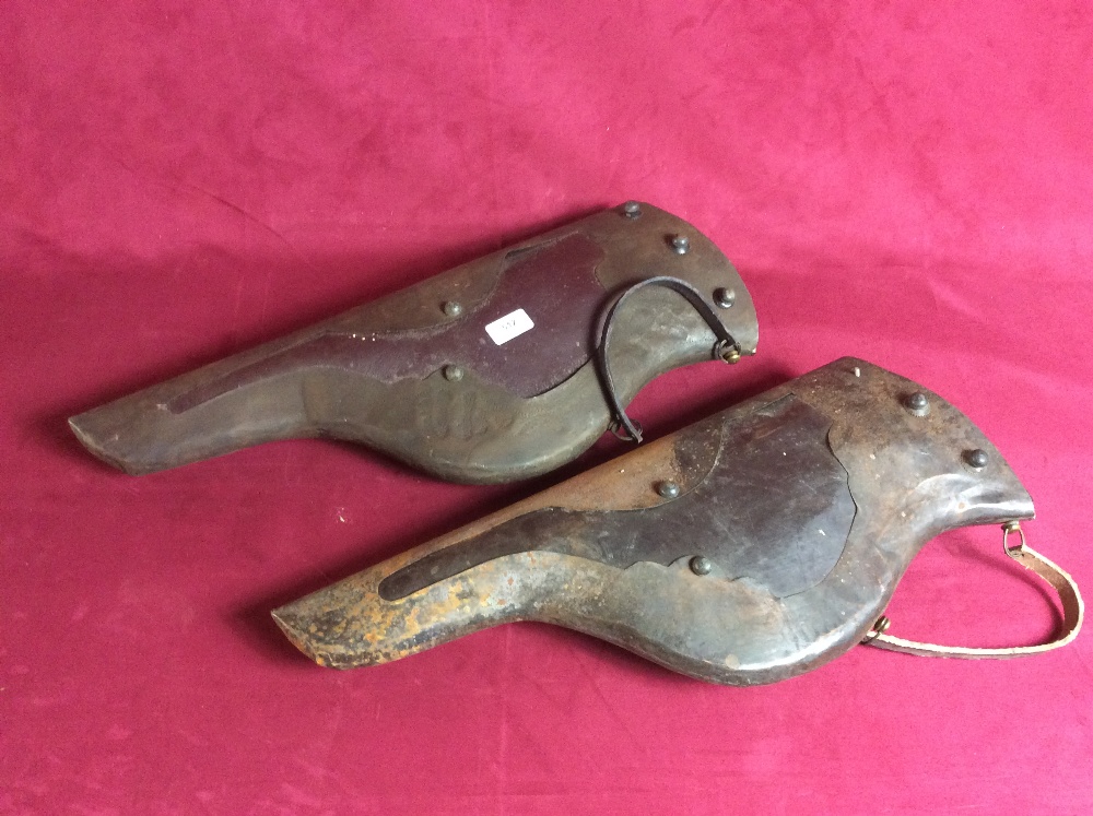 Two reproduction gun holsters for horses