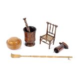 A box of treen items to include a miniature Edward