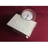 A set of vintage bathroom floor scales