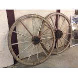 Two wooden Smythe drill wheels