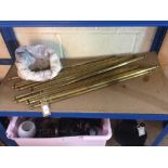 A quantity of heavy brass stair rods and fittings