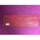 A cast iron Maldon Ironworks sign "Improved Stacking Elevator", 49.5cm x 17cm