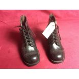 A pair of vintage child's working boots