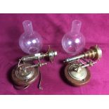 A pair of electric wall lights, possibly converted