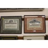 Two framed and glazed share certificates