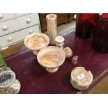 A quantity of pink onyx; two pedestal bowls; coasters etc.