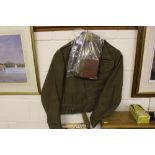 A WW2 1940 patent battle dress blouse with soldier