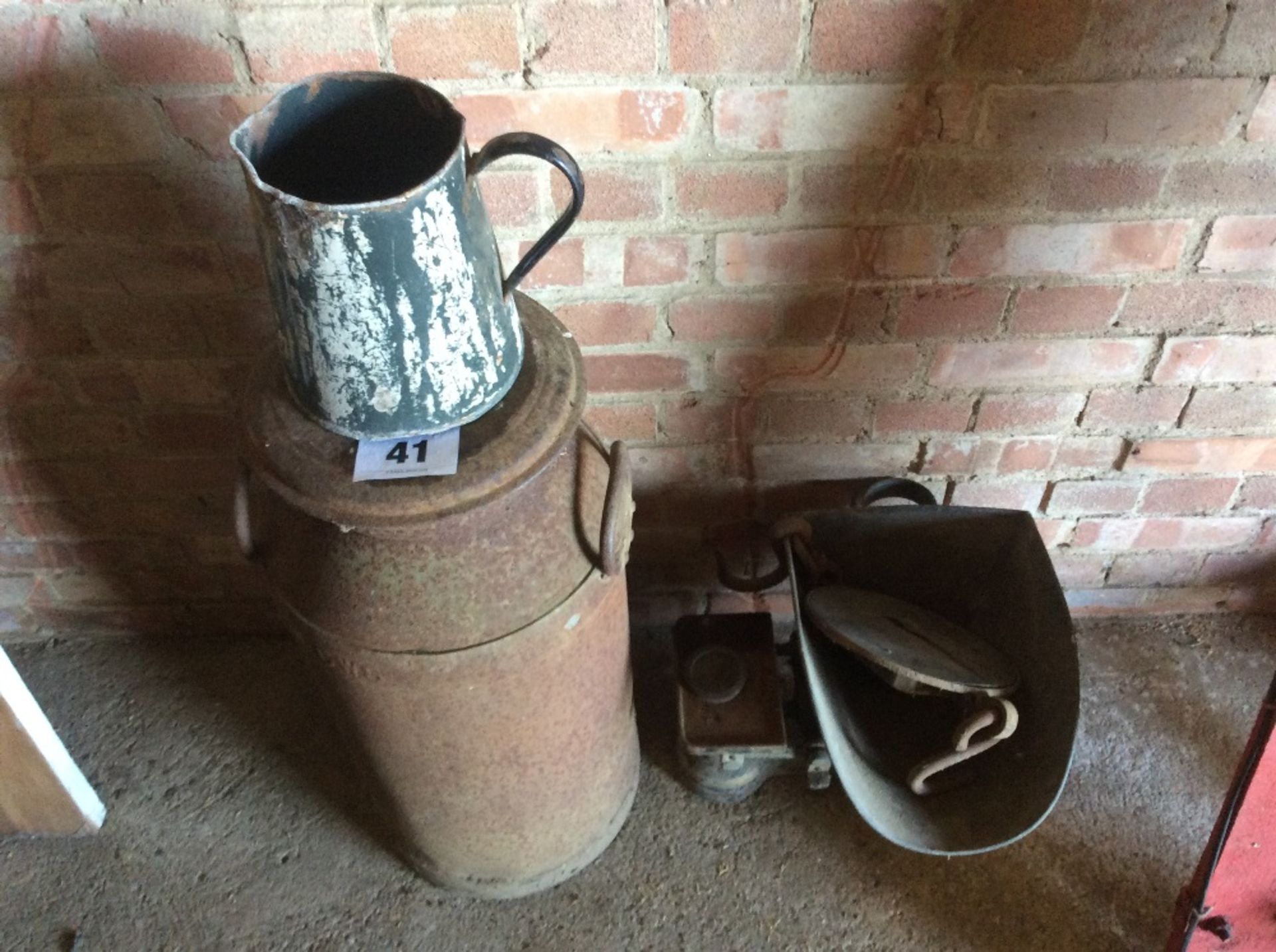 Milk churn and scales.