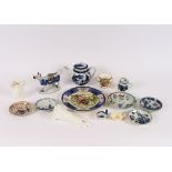 An 18th Century English porcelain blue and white mustard pot, AF; a Worcester saucer dish; a