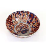 A Japanese Imari fruit bowl, of fluted form, decorated in the traditional manner, 25cm dia.