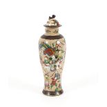 A 19th Century Chinese crackle glazed baluster vase and cover, the domed lid surmounted by a