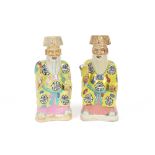 Two 18th Century Chinese porcelain polychrome decorated figures of seated dignitaries, possibly