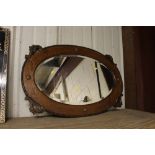 A 1920's oak framed mirror