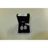 A pair of silver pear shaped drop ear-rings