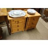 A pair of modern pine three drawer bedside chests