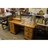 A modern pine dressing table fitted six drawers; t