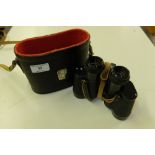 A pair of 8 x 30 USSR binoculars in carrying case