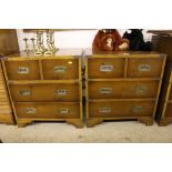 A pair of Campaign style bedside chests, each fitt