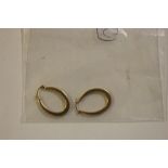 A pair of 9ct gold ear-rings