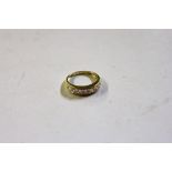 A 14ct gold half eternity ring