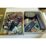 Two trays of various costume jewellery, dressing t