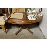 A reproduction yew wood coffee table