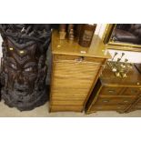 A 20th Century oak music cabinet with tambour fro