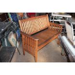 A teak garden bench