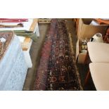 An approx 10'5" x 7'6" floral patterned rug