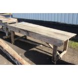 A large wooden work bench