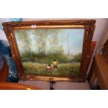 A gilt framed oil on canvas depicting a woodland s