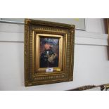 A gilt framed oleograph depicting a captain