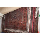 An approx 6' x 3'6 Eastern patterned rug