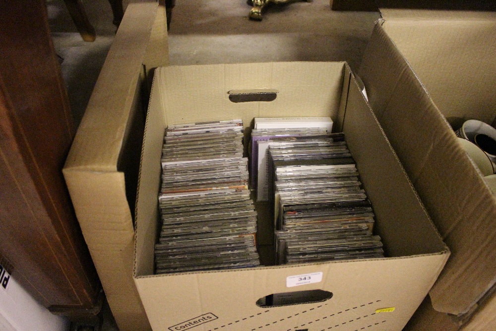 A box of various CD's