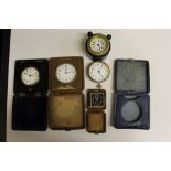 A box of travelling and alarm clocks