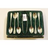 A cased set of six silver coffee spoons, and a pai