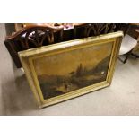 A large gilt framed oleograph study of a river and