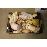 A box of dolls and parts