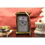 A brass cased carriage clock stamped Eustace Durra
