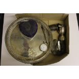 A box of silver and plated ware to include a salver; a silver cased pocket watch; silver bon-bon dis