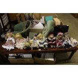 A quantity of collector's dolls