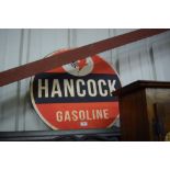 A Hancock Gasoline advertising sign