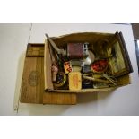 A box containing lighters, a cigar box and various