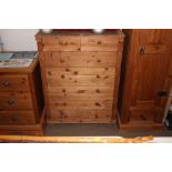 A pine chest fitted two short over five long drawe