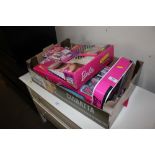 A box containing various Barbie items